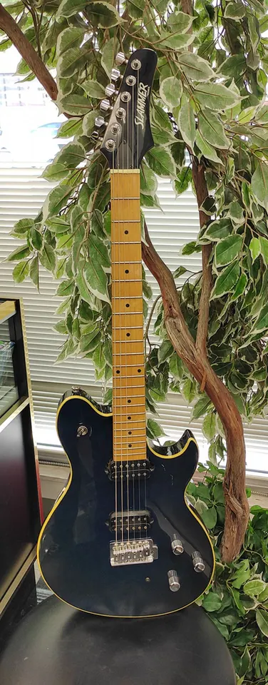 Slammer by Hamer WG1-TB Transparent Blue electric guitar with maple neck and dual humbuckers