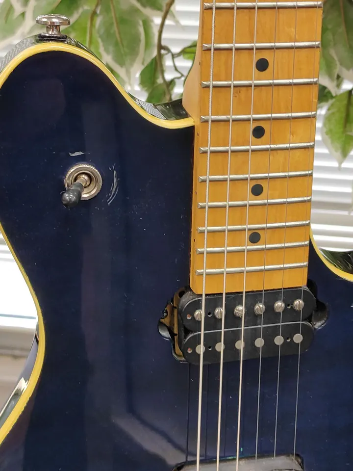 Slammer by Hamer WG1-TB Transparent Blue electric guitar with maple neck and dual humbuckers