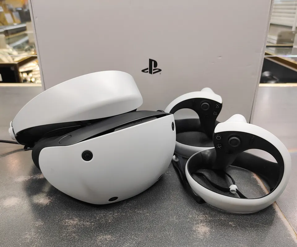 Sony PlayStation VR2 headset with two Sense controllers and inner box