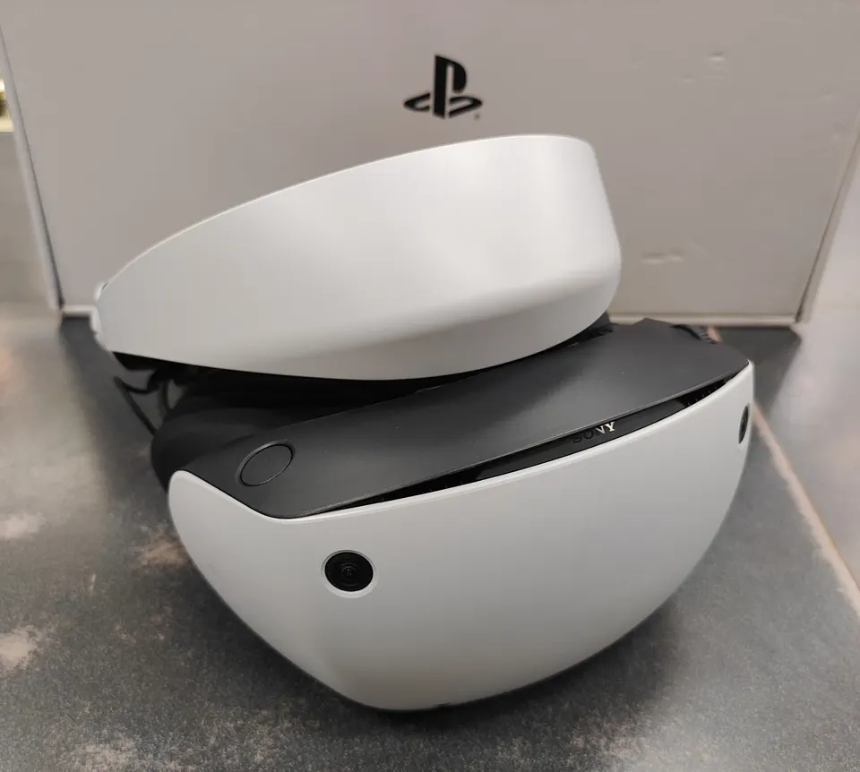 Sony PlayStation VR2 headset with two Sense controllers and inner box