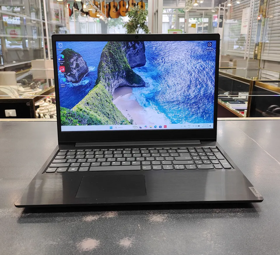 Black Lenovo IdeaPad S145 15.6-inch laptop with Windows 11 and original charger