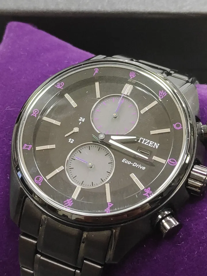 Citizen x Final Fantasy XIV DARKNESS black Eco-Drive chronograph watch with purple dial accents, complete stainless-steel bra