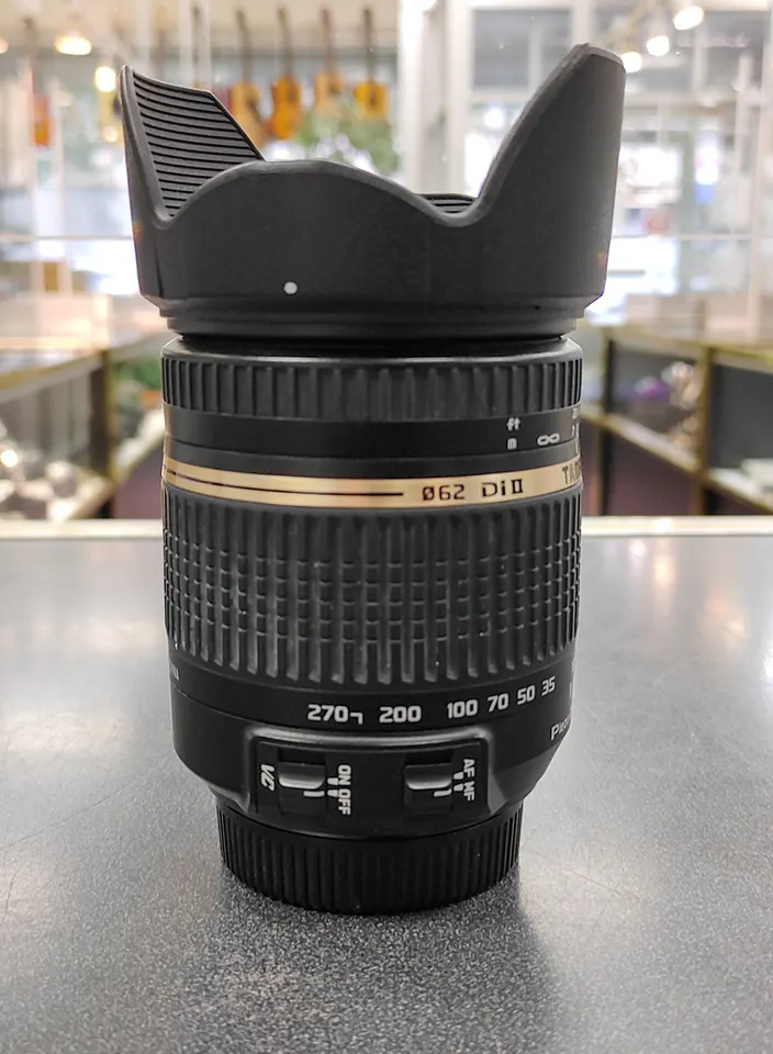 Tamron 18-270mm f/3.5-6.3 Di II VC PZD Nikon F-mount lens with hood and caps