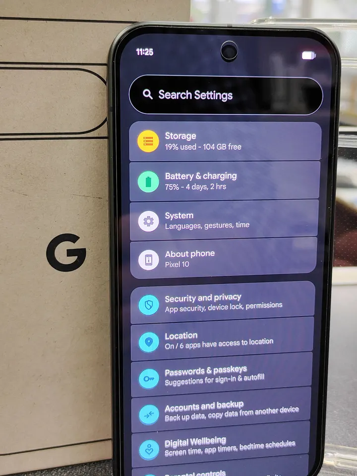 Google Pixel 10 128GB Obsidian smartphone in mint condition with original box and clear protective case