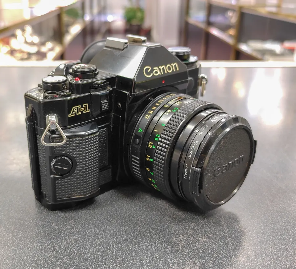 Canon A-1 35mm film camera with Canon FD 50mm f/1.8 lens in great cosmetic condition