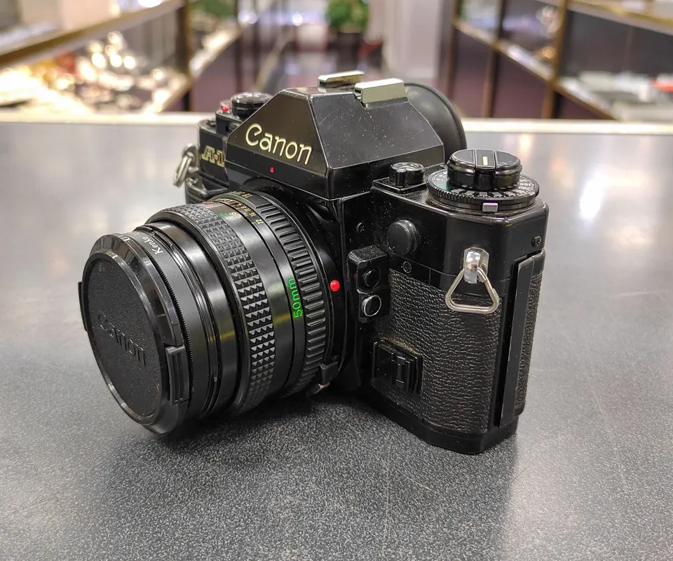 Canon A-1 35mm film camera with Canon FD 50mm f/1.8 lens in great cosmetic condition