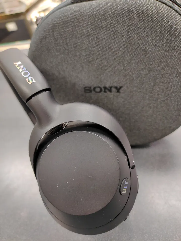 Sony ULT WEAR black wireless noise cancelling headphones with original Sony carry case, AUX cable, and USB-C charging cable