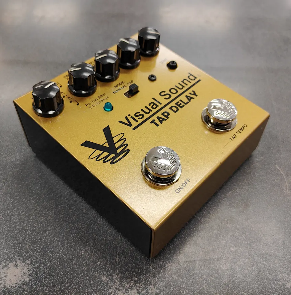 Visual Sound V3 Tap Delay pedal in gold finish with light used wear and bottom Velcro pad