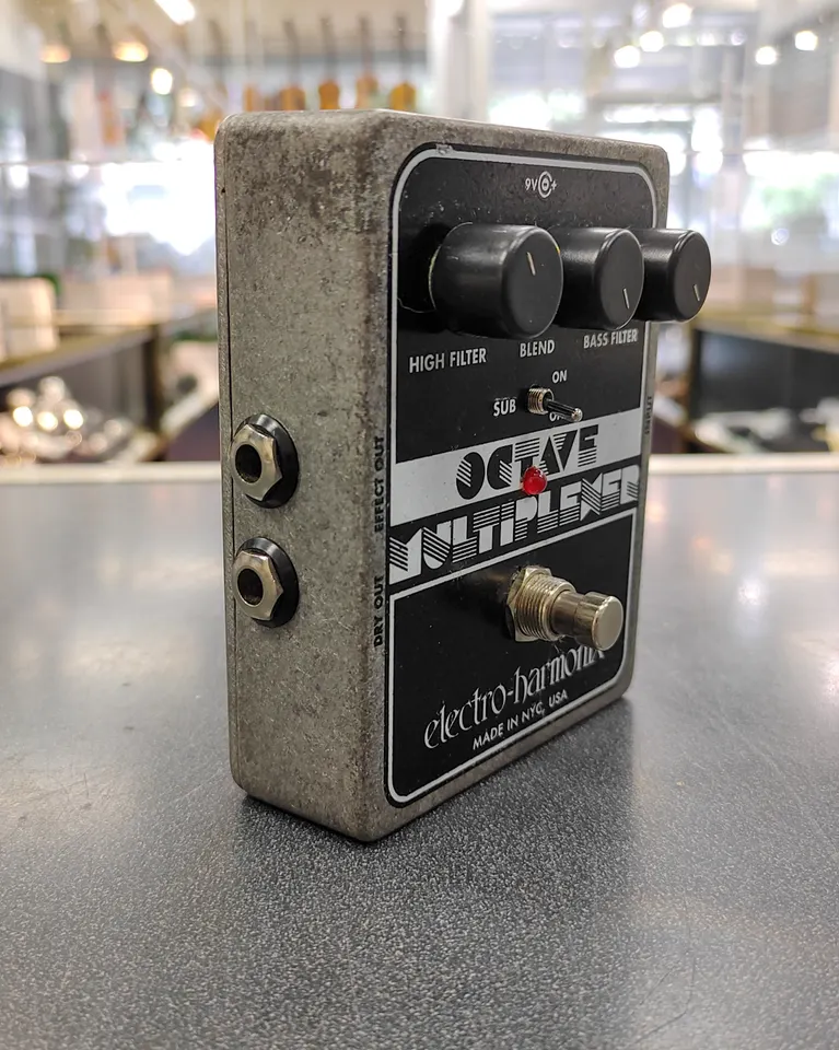 Electro-Harmonix Octave Multiplexer big-box analog sub-octave pedal with visible used wear and bottom Velcro pad