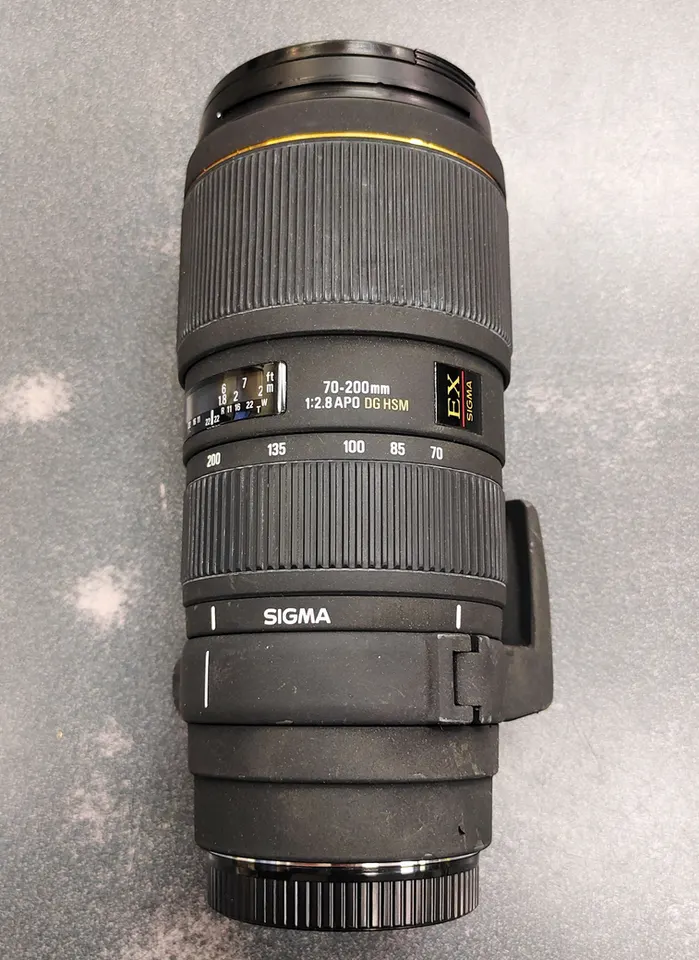 Sigma 70–200mm f/2.8 Canon EF telephoto lens with tripod collar and front and rear caps