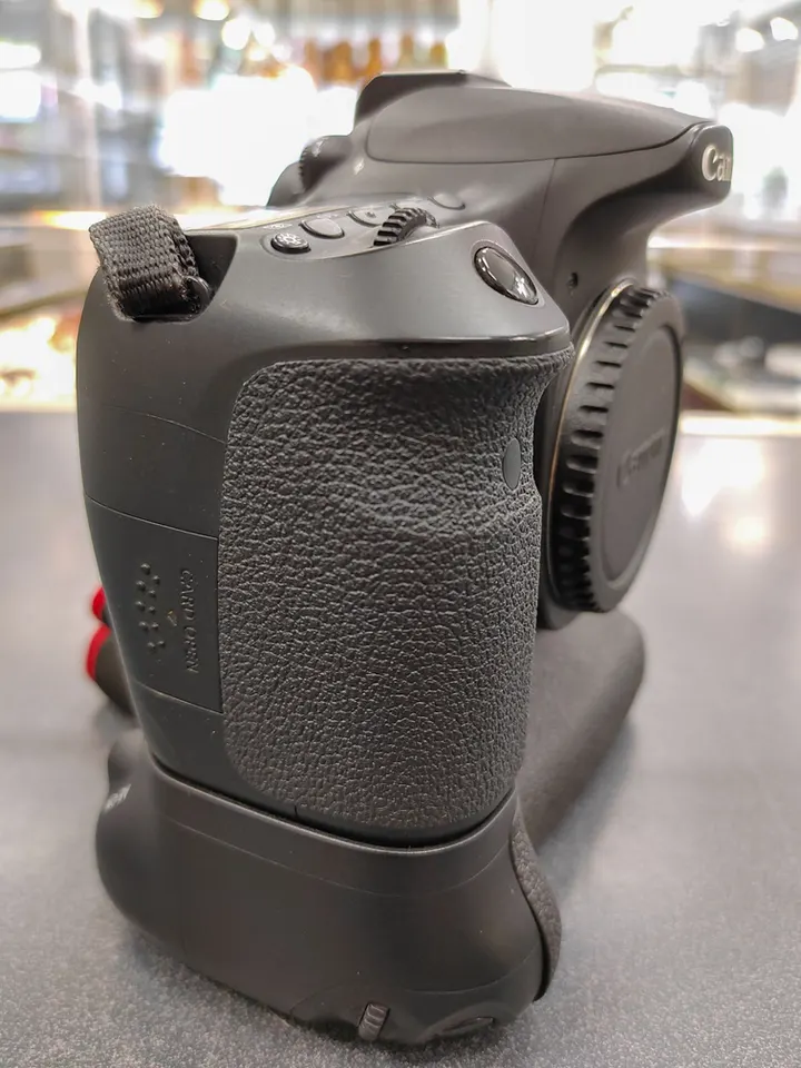 Canon EOS 60D DSLR camera body with genuine Canon BG-E9 battery grip, body cap, strap, battery, travel charger, 16GB SD card