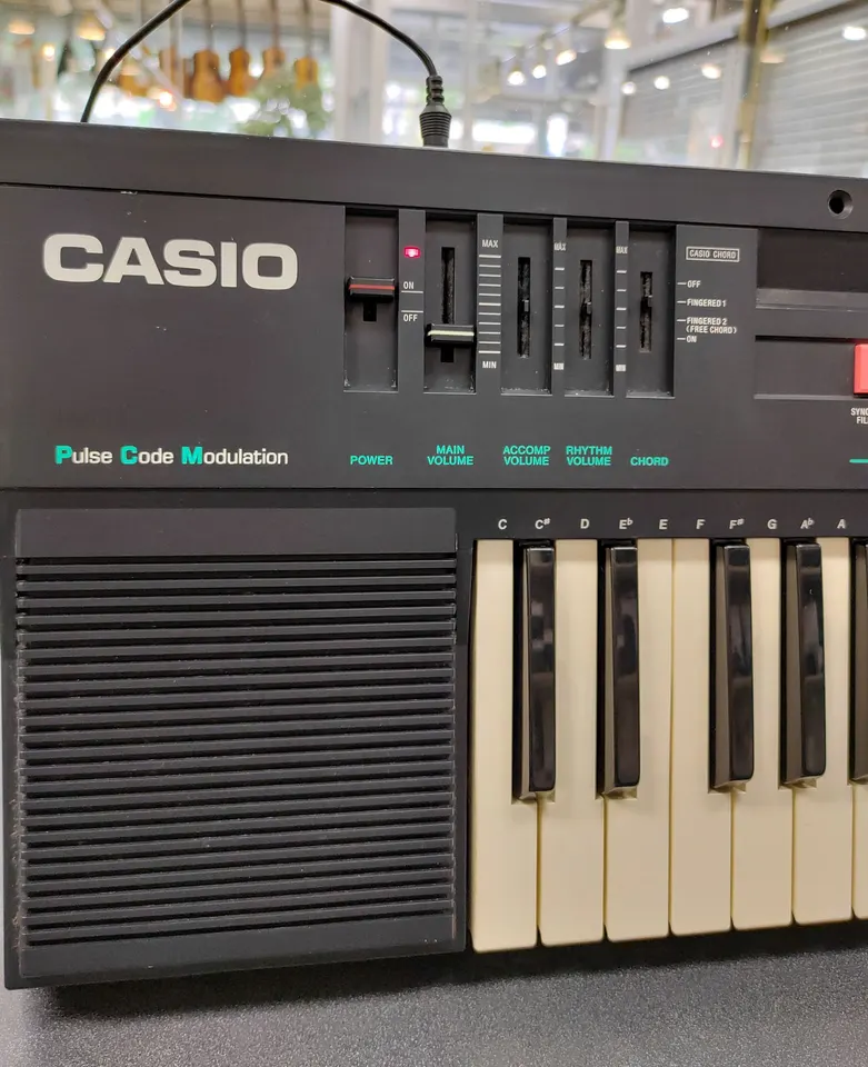 Vintage Casio Casiotone CT-370 electronic keyboard with 49 keys, 210 Sound Tone Bank, built-in speaker, rhythm controls