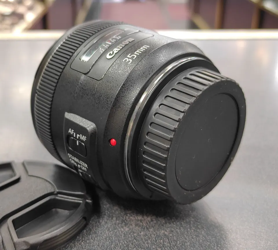 Canon EF 35mm f/2 IS USM prime lens in excellent condition with front and rear caps