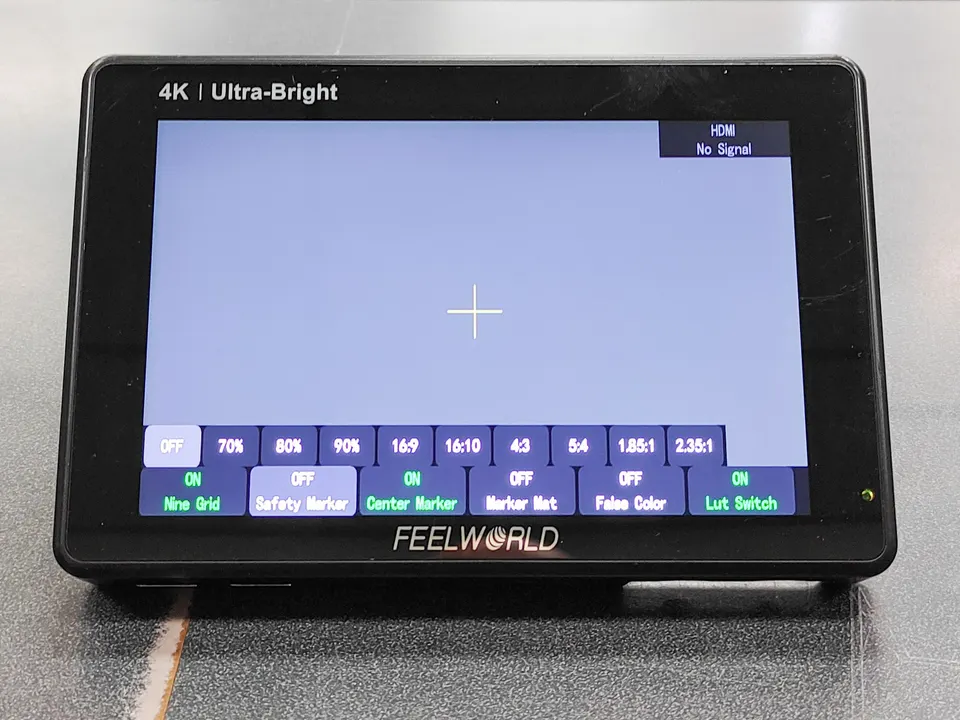 FEELWORLD LUT7S 7-inch touchscreen field monitor with three NP-F batteries