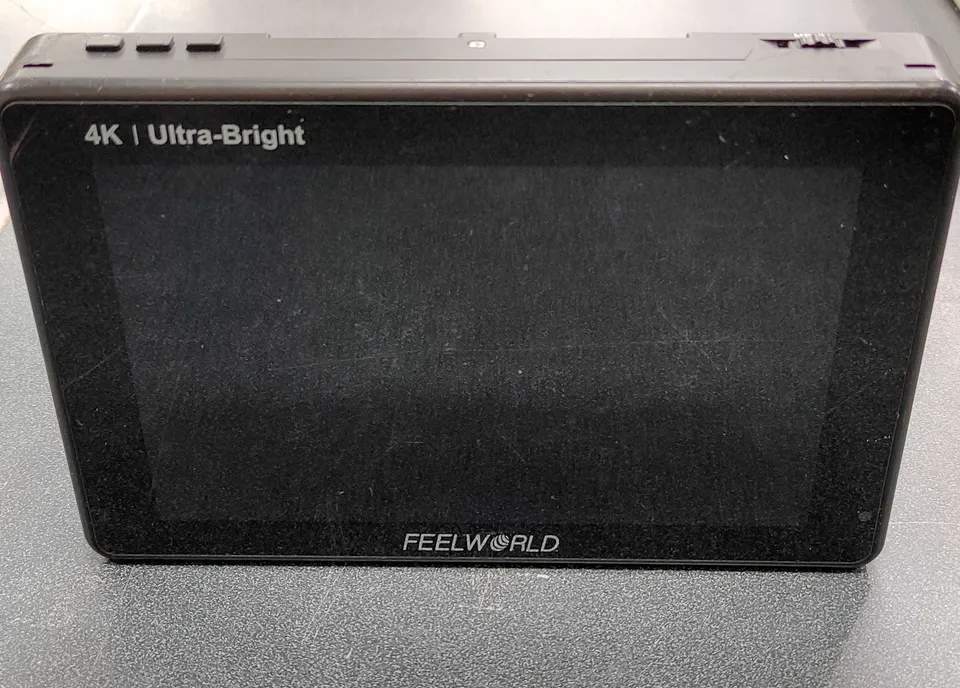 FEELWORLD LUT7S 7-inch touchscreen field monitor with three NP-F batteries