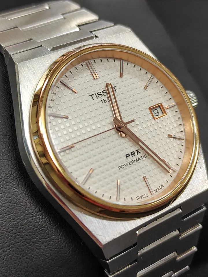 Tissot PRX Powermatic 80 automatic watch with white dial, rose-gold PVD bezel and stainless-steel bracelet