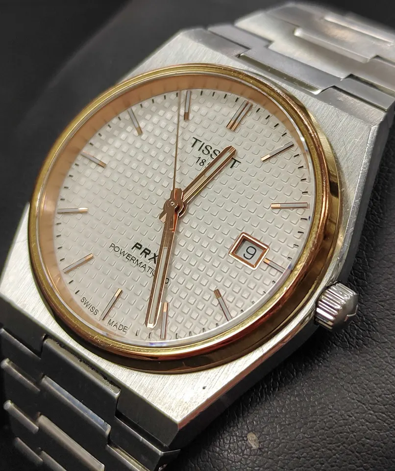Tissot PRX Powermatic 80 automatic watch with white dial, rose-gold PVD bezel and stainless-steel bracelet
