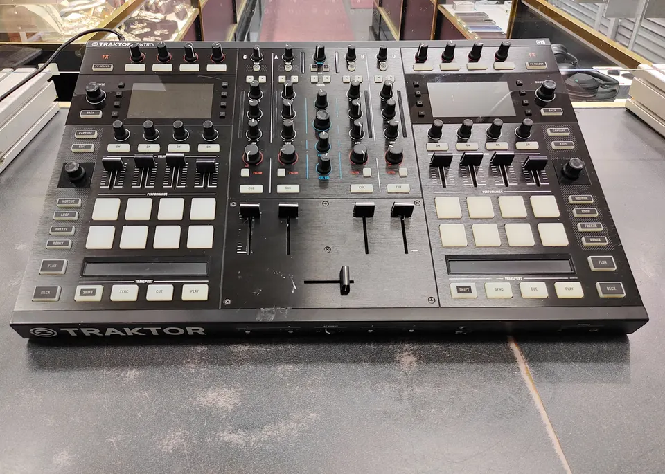 Native Instruments Traktor Kontrol S8 4-channel DJ controller with dual displays and original power adapter, with normal wear