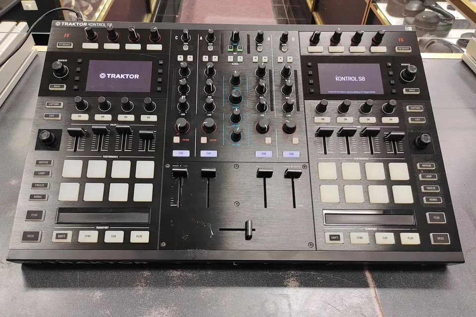 Native Instruments Traktor Kontrol S8 4-channel DJ controller with dual displays and original power adapter, with normal wear