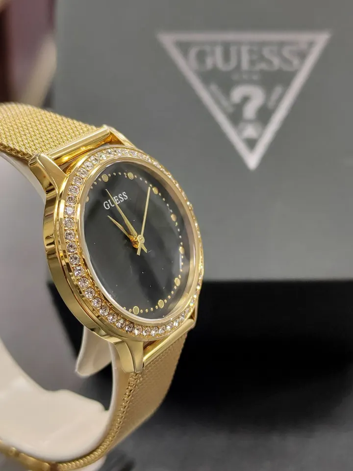 GUESS Chelsea women's gold-tone watch with black dial, crystal bezel and mesh bracelet