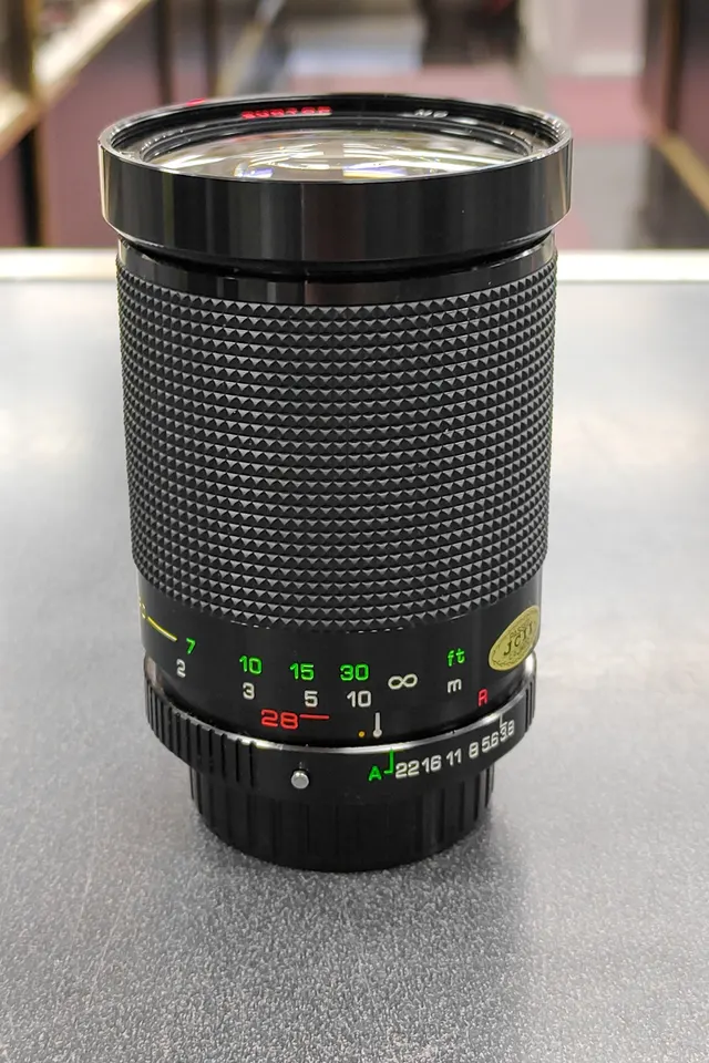 Suntop MC 28–135mm f/3.8–5.2 macro zoom lens with Canon FD breech-lock mount