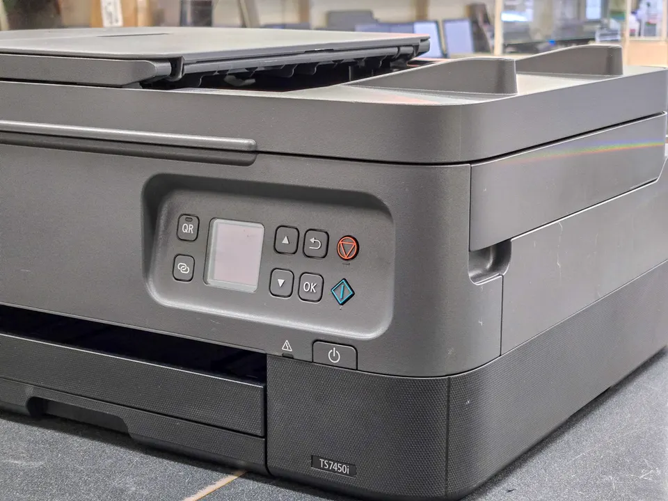 Canon PIXMA TS7450i wireless all-in-one printer shown from the front and open scanner/ADF area